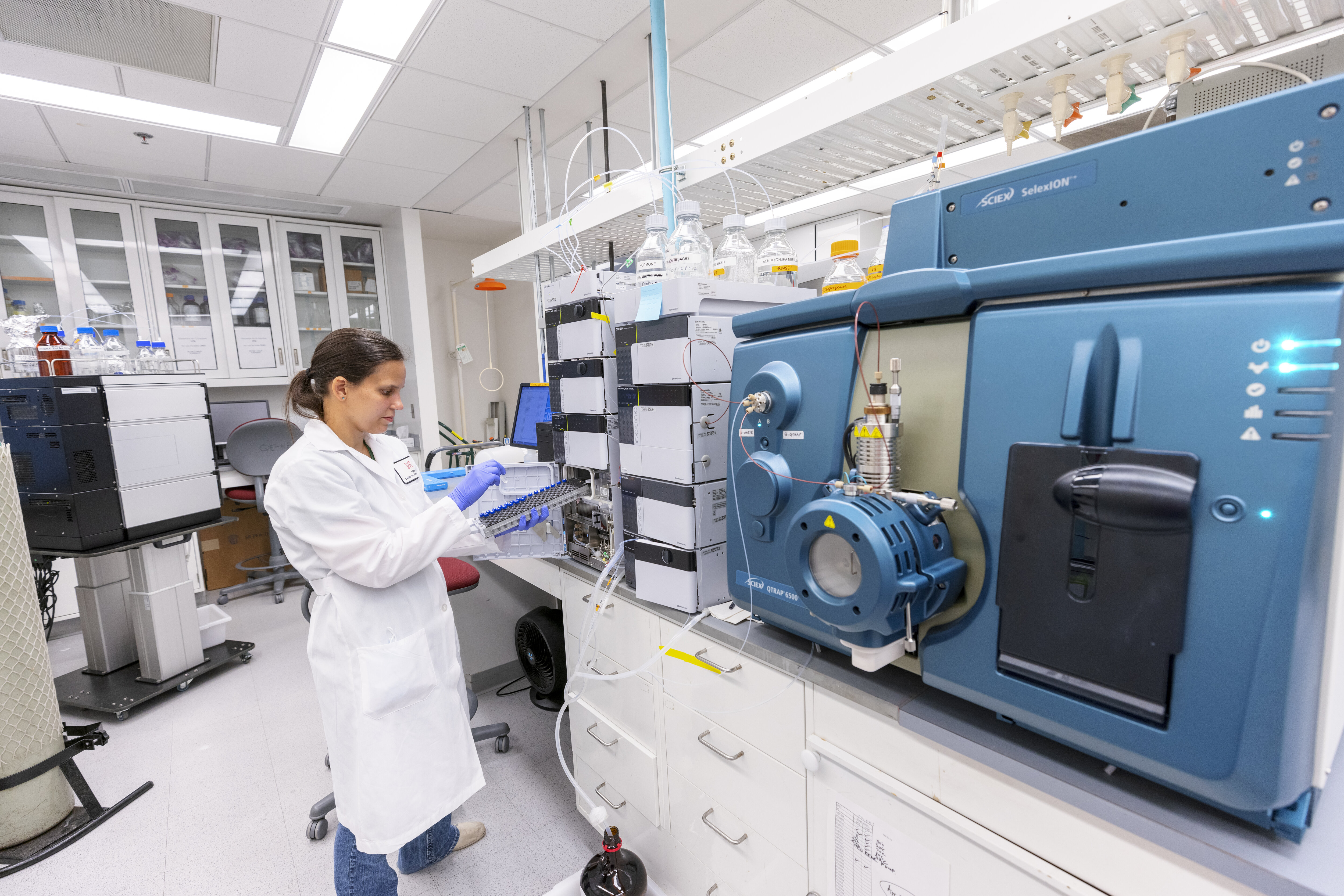 Researcher with the Sciex QTRAP 6500+ mass spectrometer with SelexION+ ion mobility coupled to Shimadzu Nexera II UHPLC